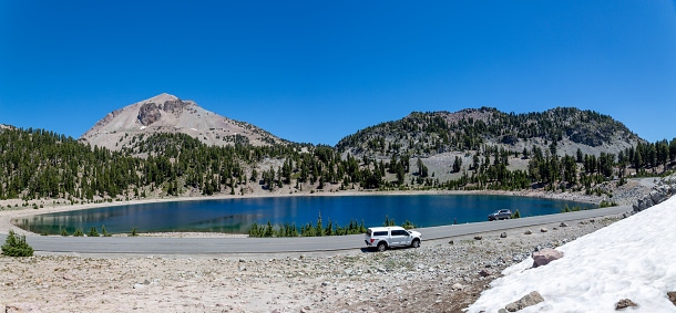 Lassen NP, CA - July 14, 2022:  View of Lake Helen and surrounding peaks and formations