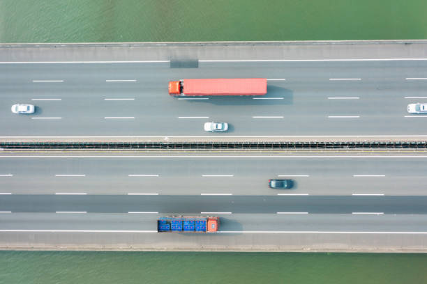 istock Cargo truck driving on high speed 1486125098
