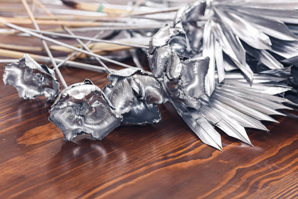 istock Vintage silver flowers for decoration, lie on the table. 1486127132