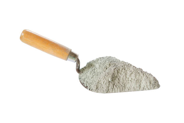 istock Trowel and cement pile isolated on white with cliping path 1486128722