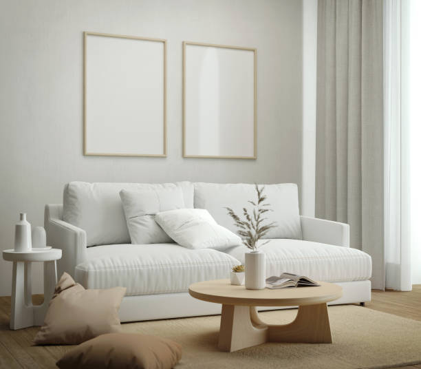 istock Picture frame mock up in white living room with sofa and table.3d rendering 1486136030