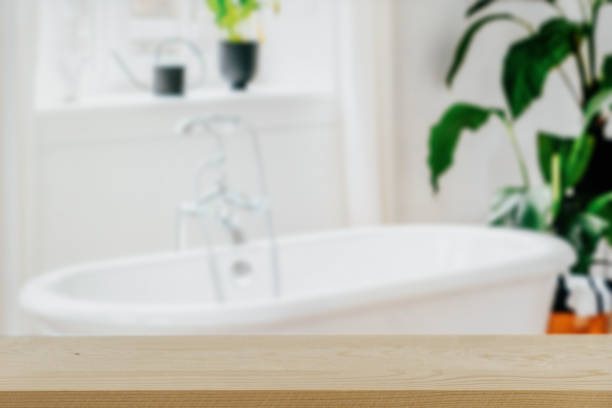 istock Empty wooden table in the blurred bathroom background 1486136130