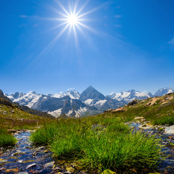 Stunning mountains reflecting in a calm tidal pool, serene landscape, peaceful coast. Perfect backdrop for nature themes, tranquility, and outdoor adventures.