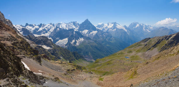 istock mountain valley with small lake  under blue cloudy sky 1486141733