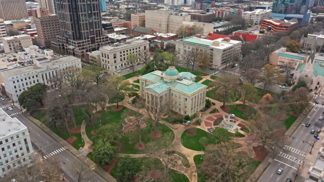 Aerial revealing shot of the North Carolina State Capitol in Raleigh