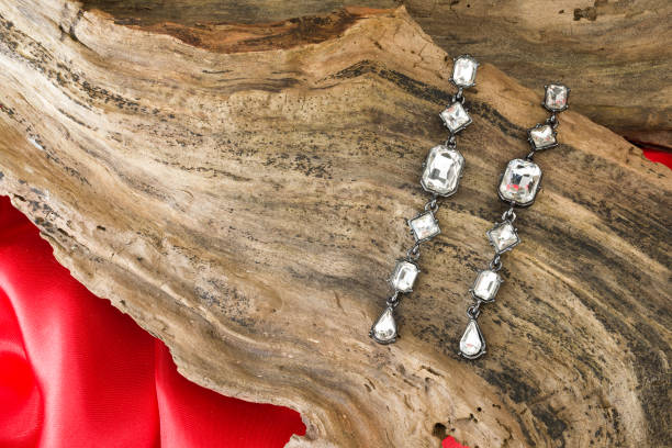 istock beautiful stone earrings on wooden background 1486144950