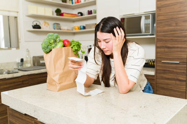 istock Stressed woman worried about expensive groceries 1486146877