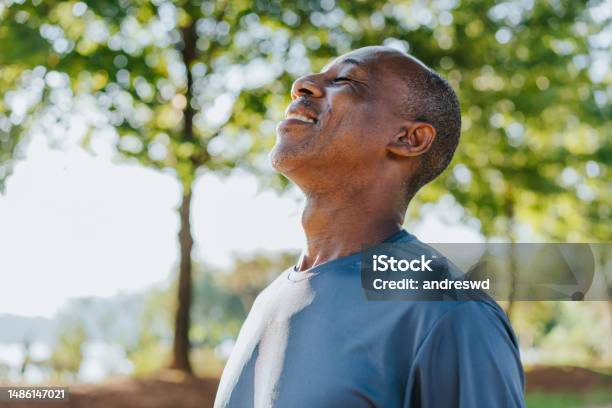 Portrait Of A Mature Man Breathing Fresh Air Stock Photo - Download Image Now - People, Healthy Lifestyle, Happiness