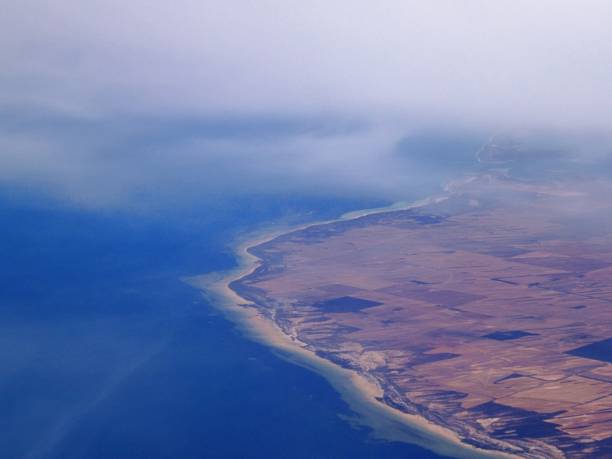 istock Flying over australian coastline 1486147662
