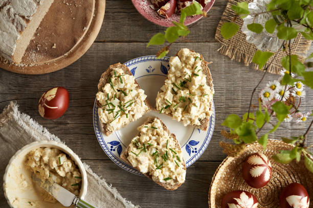 istock Slices of bread with bread spread made of hard boiled Easter eggs 1486148118