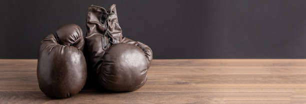 istock gloves for boxing on the wooden table 1486149963