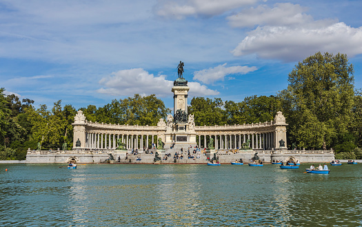 Alfonso XII Monument and lake in the Buen Retiro Park (Parque del Buen Retiro) in spring in Madrid, Spain