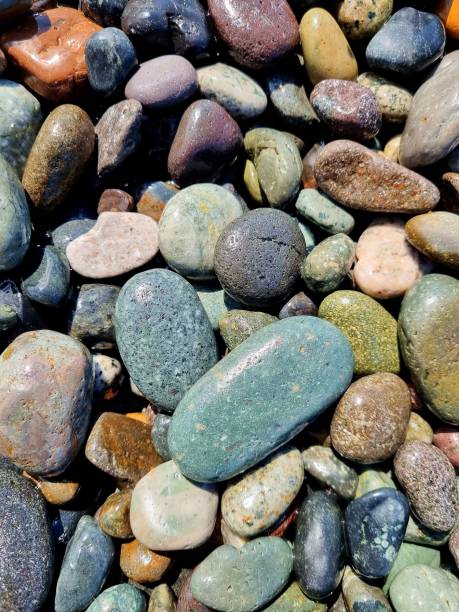istock Colorful rounded pebbles on the beach 1486159091