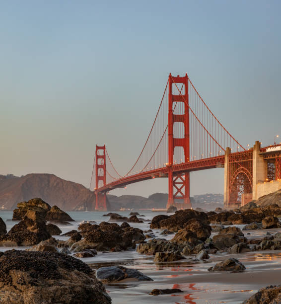 istock Golden Gate Bridge and Baker Beach Rocks at Sunset 1486166695