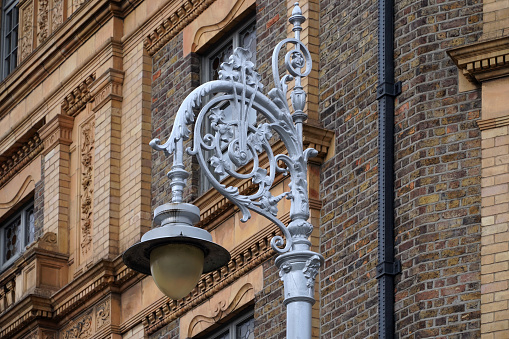 Ornate iron street lamp with shamrock design found in older neighborhoods of Dublin