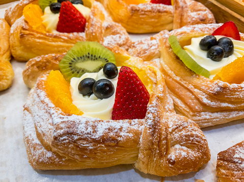 Close-up photo of pastries with fruit.
