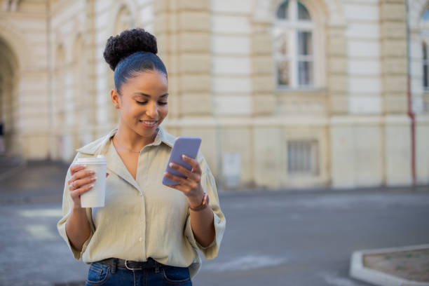 istock Portrait of a young woman using smartphone 1486178663