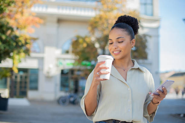 istock Happy young woman using phone 1486178664