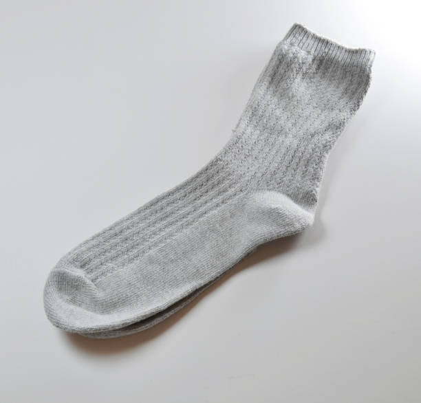 istock the grey color Socks on white background 1486178878
