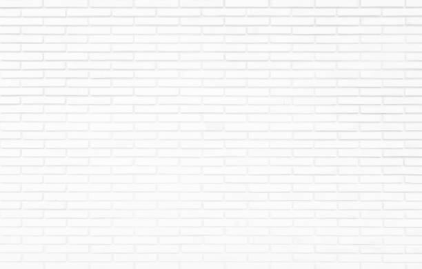 istock White grunge brick wall texture background for stone tile block painted in grey light color wallpaper modern interior and exterior and room backdrop design. Simple seamless pattern grid for backdrop. 1486180430