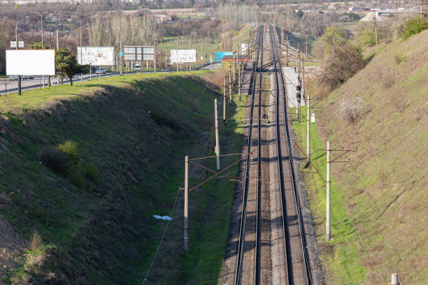 istock railroad top perspective view. Empty billboards on the side of the road 1486190873