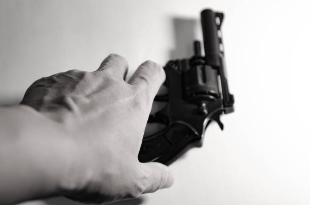 istock Gun in hand  monotone in crime concept. 1486200220