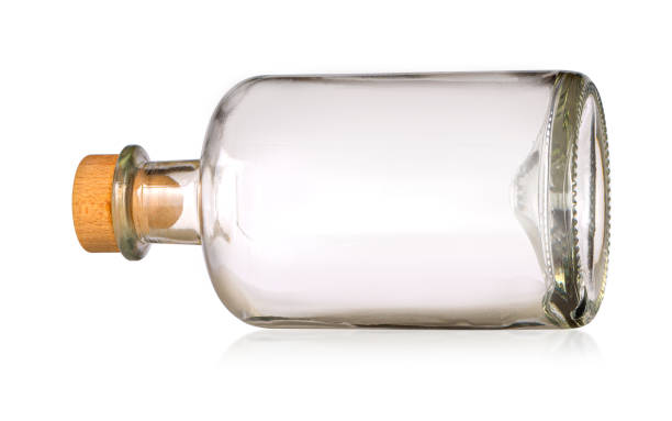 istock Empty colorless glass bottle, isolated. 1486213180