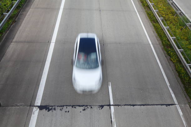istock Motorway A27, car with motion blur, bird perpetuity, Bremen, Germany 1486217730