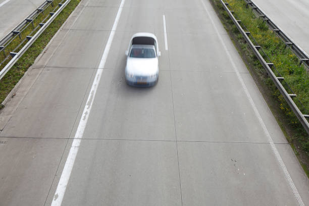 istock Motorway A27, car with motion blur, bird perpetuity, Bremen, Germany 1486217763
