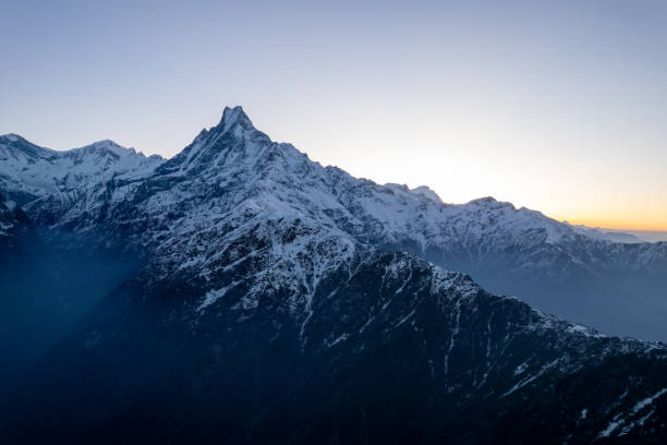 istock The sunset casting its warm golden glow over the mountain peaks 1486219068