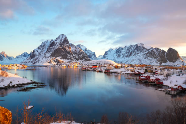 Panorama view of morning sun on fishing villages on the Lofoten Islands, Northern Norway. stock photo
