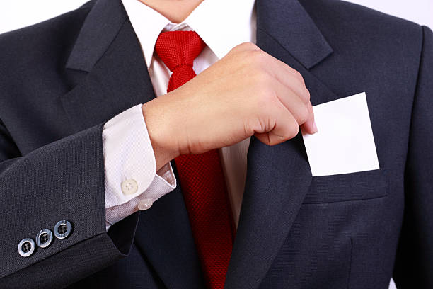 istock business man holding blank white card 148621990
