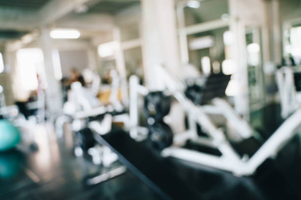 Abstract blurred empty fitness sport gym indoor fitness room