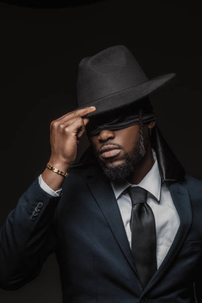 istock Blindfolded elegant black male posing for studio portrait 1486226610