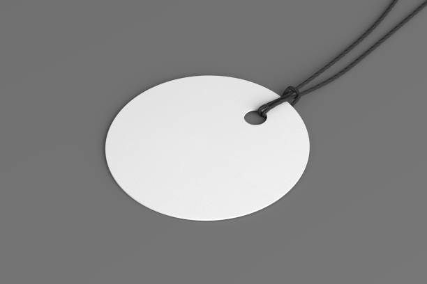 istock White round tag mockup on gray background. Side view 1486227328