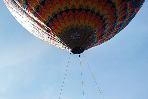 Vivid colored hot air balloons at a balloon festival.  rm