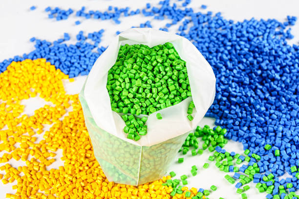 istock color dye for plastic granules in yellow, blue and green. material for polymer production. chemical industry. 1486229379