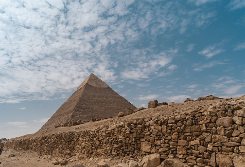 young man visits pyramids of Giza