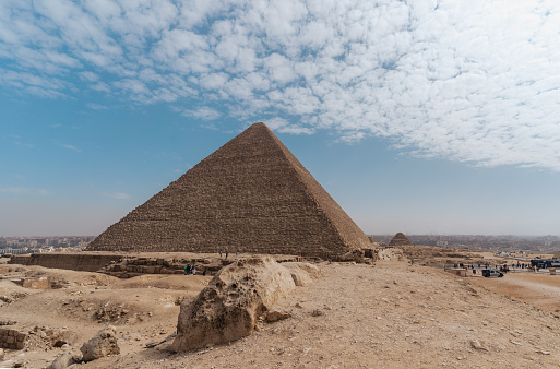 young man visits pyramids of Giza