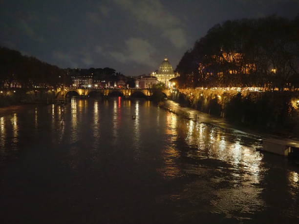 istock St. Peter's Basilica, Ponte Sant'Angelo and Tiber, by night 1486256931