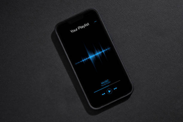 istock Smartphone with music player app on dark grey background 1486260703