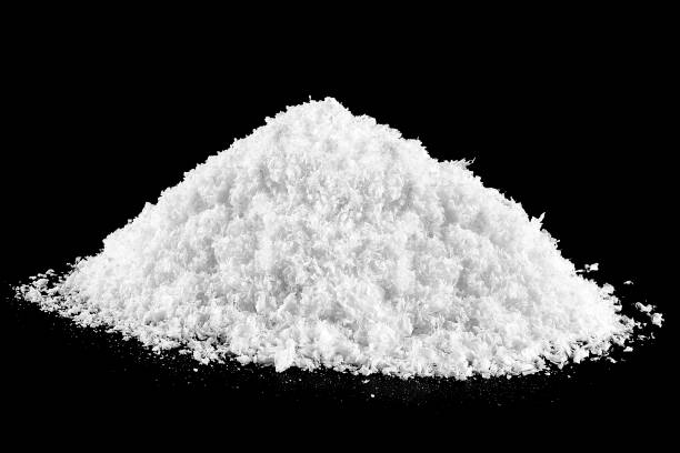 istock Isolated image of white fluffy snow on a black background. Christmas night. 1486263046
