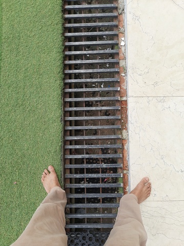 irrigation covered with gratings between the courtyards of the mosque