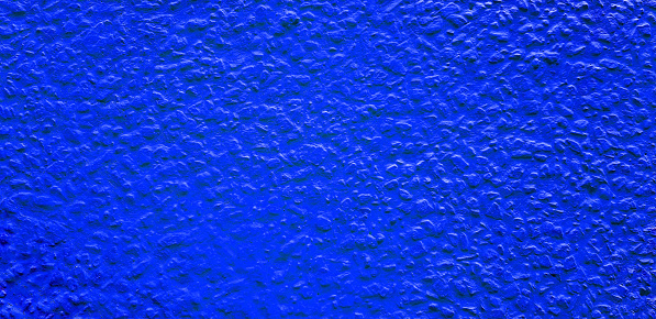 Rough or grunge blue painted concrete or cement wall for background. Retro wallpaper, Colorful, Painting and Texture of surface concept