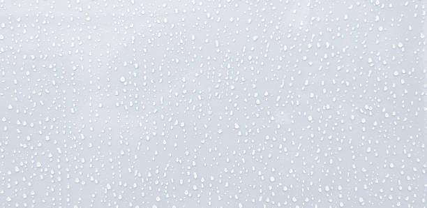 istock Raining or water drop on gray or white stainless steel wall for background 1486270889