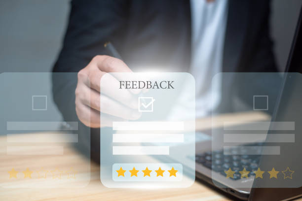 istock Man using laptop and touch virtual screen and give five star symbol to increase rating of product and service concept, Customer satisfaction, selective focus. 1486271015