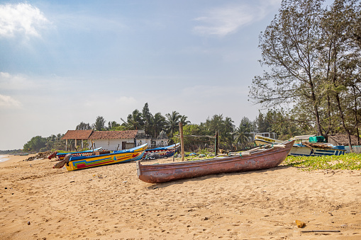 Fishing boats beached along the coast  in Mamallapuram, Tamil Nadu, India