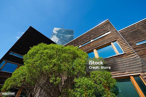 Modern Office Building In Green Environment Stock Photo - Download Image Now - Architecture, Beige, Blue
