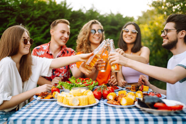 istock Company gathered for barbecue. 1486288389