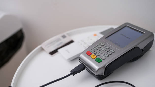 istock Terminal for contactless payment, pos device for e-payment with wire 1486291809